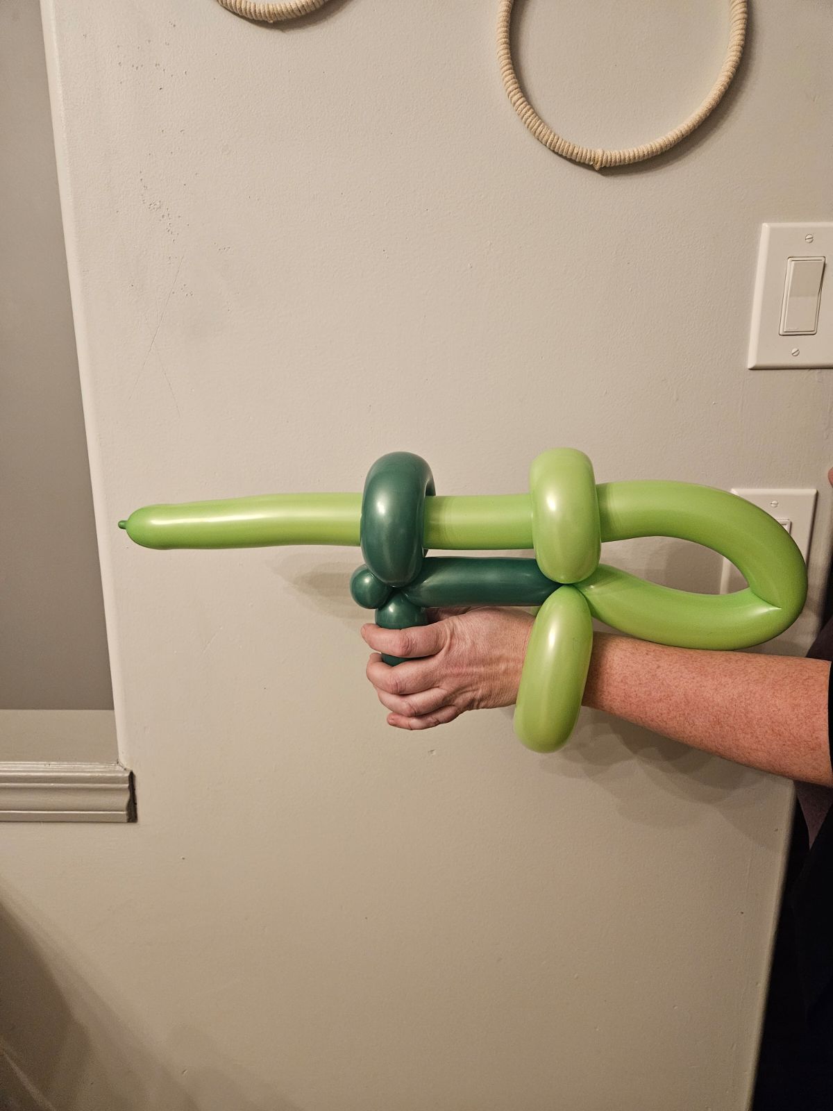 green balloon tommy gun